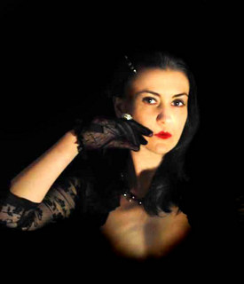 Miss Myers signature blood red lips will most definitely feature